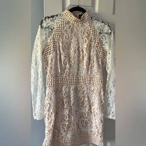 Lace mockneck mini dress by Prettylittlething